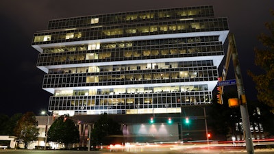 Cars pass Purdue Pharma headquarters.