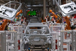 Robots work on an electric car.