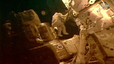 Astronauts Bob Behnken and Chris Cassidy on a spacewalk, July 21, 2020.