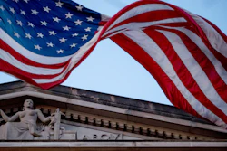 American flag flies outside the Department of Justice in Washington.