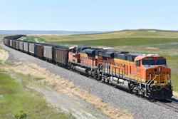 A BNSF Railway train hauling carloads of coal from the Powder River Basin of Montana and Wyoming is seen east of Hardin, Mont., on July 15, 2020. A coalition of states is renewing its push to stop the Trump administration from selling coal from public lands.