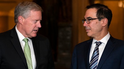 Treasury Secretary Steven Mnuchin and White House chief of staff Mark Meadows on Capitol Hill, Aug. 6, 2020.