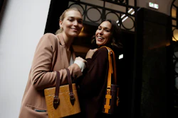 Model Arizona Muse, left, is flanked by designer and Officina del Poggio owner Allison Hoeltzel Savini.