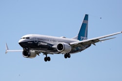 A Boeing 737 MAX jet heads to a landing at Boeing Field following a test flight.