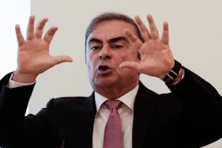 Nissan's former executive Carlos Ghosn speaks at a press conference.