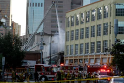 Firefighters work the scene of a structure fire in Los Angeles, May 16, 2020.