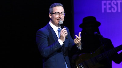 John Oliver performs at the 13th annual Stand Up For Heroes benefit concert.