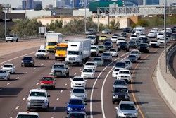 In this Jan. 24, 2020 file photo, early rush hour traffic rolls along I-10 in Phoenix. The U.S. government’s road safety agency is offering a smartphone app that will alert drivers if their vehicles are recalled. The National Highway Traffic Safety Administration was to roll out the app for Android and Apple phones on Thursday, Aug. 27.
