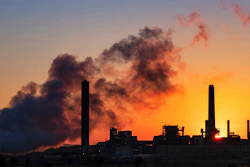 The Dave Johnson coal-fired power plant is silhouetted against the morning sun in Glenrock, Wyo.