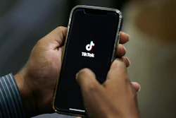 A man opens the TikTok app on his cell phone, Islamabad, Pakistan, July 21, 2020.