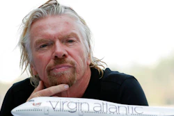 In this June 16. 2011, file photo, Richard Branson, president of Virgin Atlantic Airways, attends a news conference in Miami Beach, Fla. Branson announced that Virgin was starting flights between London and Cancun, Mexico. Virgin Atlantic, the airline founded by British businessman Branson, filed Tuesday, Aug. 4, 2020, for relief from creditors as the virus pandemic hammers the airline industry. The airline made the filing in U.S. federal bankruptcy court in New York after a proceeding in the United Kingdom.