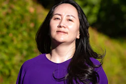 Meng Wanzhou, chief financial officer of Huawei, leaves her home to attend a court hearing in Vancouver.