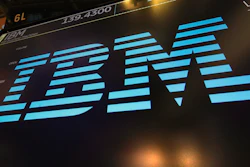 In this March 18, 2019, file photo, the logo for IBM appears above a trading post on the floor of the New York Stock Exchange. IBM says it is breaking off a $19 billion chunk of its business to focus on cloud computing. The 109-year-old tech company said Thursday, Oct. 8, 2020, it is spinning off its managed infrastructure services unit into a new public company, temporarily named NewCo.