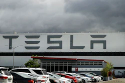 This May 12, 2020 file photo photo shows the Tesla plant in Fremont, Calif. Tesla’s third-quarter sales rose 44% from a year ago as global demand for its electric vehicles proved stronger than most other automakers. The company said it delivered 139,000 SUVs and sedans from July through September compared with 97,000 deliveries during the same period a year ago.