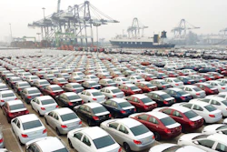 New cars wait to be transported from a port Yantai in east China's Shandong province Wednesday, Oct. 21, 2020.