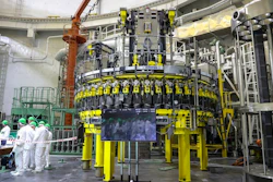 Personnel work to begin loading nuclear fuel at Belarus' first nuclear plant.