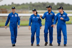 Astronaut Soichi Noguchi, of Japan, from left, NASA Astronauts Shannon Walker, Victor Glover and Michael Hopkins walk after arriving at Kennedy Space Center, Sunday, Nov. 8, 2020, in Cape Canaveral, Fla.