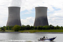 A boat travels on the Tennessee River near the Watts Bar Nuclear Plant near Spring City, Tenn.