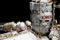 Russian astronauts Commander Sergey Ryzhikov, left, and Sergey Kud-Sverchkov outside the International Space Station, Nov. 18, 2020.