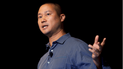 Tony Hsieh speaks during a Grand Rapids Economic Club luncheon in Grand Rapids, Mich.
