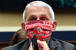 In this June 23 file photo, Director of the National Institute of Allergy and Infectious Diseases Dr. Anthony Fauci wears a face mask as he waits to testify before a House Committee on Energy and Commerce on the Trump administration's response to the COVID-19 pandemic on Capitol Hill in Washington.