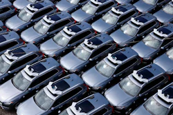 A parking lot full of Uber self-driving Volvos in Pittsburgh.