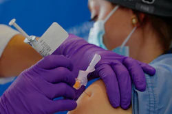 Catalina Gonzalez-Marques, an emergency medical physician, receives the Pfizer-BioNTech coronavirus vaccine.