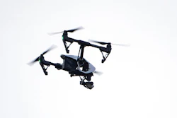 A drone flies in a residential neighborhood in Upper Moreland, Pa., Aug. 8, 2019.