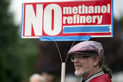 Mark Keely of Kalama, Wash., stands with other protesters outside the Washington Department of Ecology's Vancouver field office in 2017.