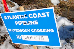 Signs that mark the route of the Atlantic Coast Pipeline in Deerfield, Va.