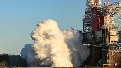 The core stage for the first flight of NASA's Space Launch System rocket undergoes a hot fire test at the Stennis Space Center near Bay St. Louis, Miss., Jan. 16, 2021.