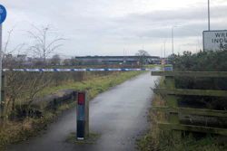 A police cordon at Wrexham Industrial Estate near the British pharmaceutical manufacturing company Wockhardt, Wrexham, Wales, Jan. 27, 2021.