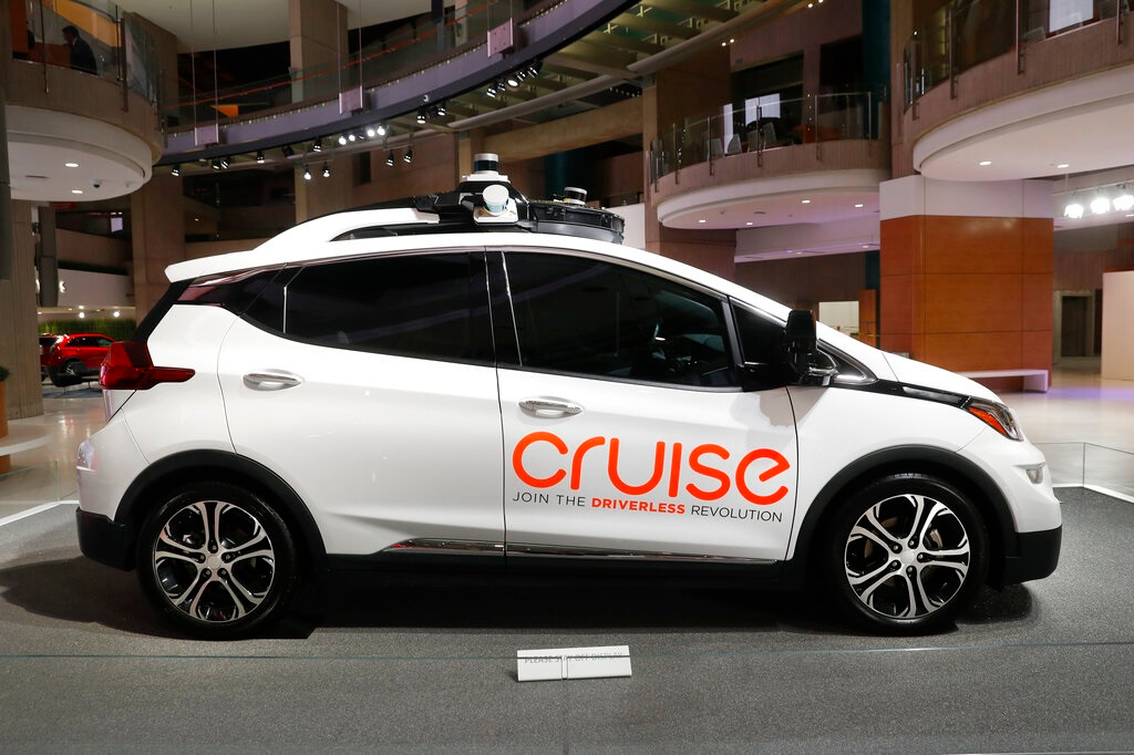 In this Jan. 16, 2019, file photo, Cruise AV, General Motor's autonomous electric Bolt EV is displayed in Detroit. General Motors' self-driving car company is sending vehicles without anybody behind the wheel in San Francisco as it navigates its way toward launching a robotic taxi service that would compete against Uber and Lyft in the hometown of the leading ride-hailing services. The move announced Wednesday, Dec. 9, 2020, by GM-owned Cruise come two months after the company received California&rsquo;s permission to fully driverless cars in the state.