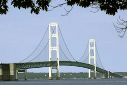This July 19, 2002, file photo, shows the Mackinac Bridge that spans the Straits of Mackinac from Mackinaw City, Mich. Michigan's environmental agency said Friday, Jan. 29, 2021, it had approved construction of an underground tunnel to house a replacement for a controversial oil pipeline in a channel linking two of the Great Lakes.