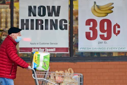 A man walks out of a Marc's Store, Friday, Jan. 8, 2021, in Mayfield Heights, Ohio. Fewer Americans applied for unemployment benefits last week, lowering claims to 900,000, still a historically high level that points to further job cuts in a raging pandemic.