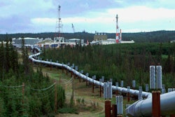 In this undated file photo the Trans-Alaska pipeline and pump station north of Fairbanks, Alaska is shown. The International Energy Agency says oil and gas companies aren't doing enough to reduce the release of methane, a potent source of planet-heating emissions, that is seeping out of pipelines and production plants.