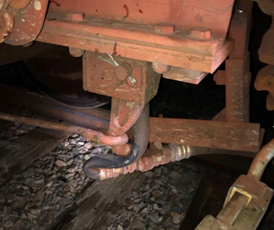 Kinked end-of-railcar air hose on train involved in the November 23, 2018, incident west of Cheyenne, Wyoming.