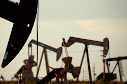 In this file photo, oil rigs stand in the Loco Hills field near Artesia, N.M.. In the closing months of the Trump administration energy companies stockpiled enough drilling permits for western public lands to keep pumping oil for years.