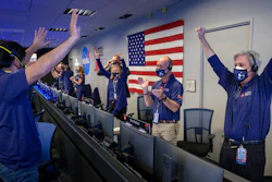 Members of NASA's Perseverance rover team react in mission control after receiving confirmation the spacecraft successfully touched down on Mars, Feb. 18, 2021, NASA's Jet Propulsion Laboratory, Pasadena, Calif.