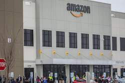 In this file photo, workers at Amazon's fulfillment center in Staten Island, N.Y., gather outside to protest work conditions.