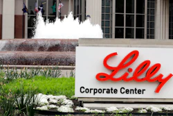 In this April 26, 2017, file photo shows the Eli Lilly and Co. corporate headquarters in Indianapolis. Eli Lilly’s new COVID-19 treatment helped the drugmaker’s fourth-quarter profit surge even though U.S. regulators approved its use late in the quarter. The antibody treatment bamlanivimab brought in $871 million in sales for Lilly after the Food and Drug Administration authorized emergency use in November 2020 for patients with mild-to-moderate COVID-19.