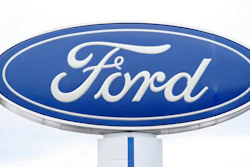 In this Sunday, Dec. 20, 2020, file photo, the company logo is viewed on a sign outside a Ford dealership, in Centennial, Colo. Ford has lost track of some older Takata air bags that can explode and hurl shrapnel, so it's recalling more than 154,000 vehicles in North America to check for them. The company on Thursday, Feb. 18, 2021, issued two recalls, with the largest coming because Ford can't find 45 obsolete air bags that may have been installed on some old Ranger pickup trucks.