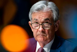 In this Dec. 1, 2020 file photo, Federal Reserve Chair Jerome Powell listens during a Senate Banking Committee hearing on Capitol Hill in Washington. Federal Reserve officials were convinced last month that the U.S. economy and job growth had slowed as coronavirus cases surged across the country. They noted that the economy's outlook is heavily dependent on the course of the virus.