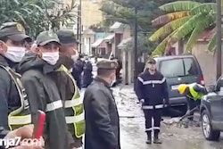 In this image made from video provided by Tanja 7, firefighters and emergency workers at the scene of flooding in Tangier, Morocco, Monday, Feb, 8 2021.