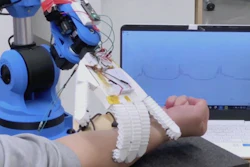 The robotic arm monitoring electrical signals.