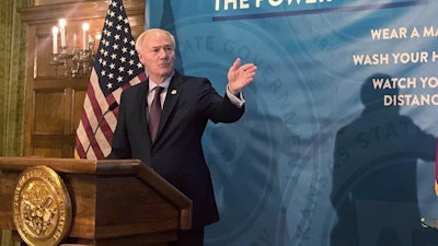 Arkansas Gov. Asa Hutchinson during a news conference at the state Capitol in Little Rock, Jan. 12, 2021.