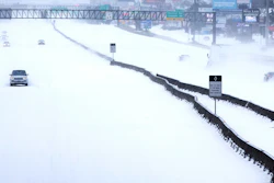 In this Feb. 15, 2021, file photo, traffic is sparse on the snow-covered Interstate 45 near The Woodlands Parkway following an overnight snowfall in The Woodlands, Texas. Temperatures plunged into the teens Monday with light snow and freezing rain.