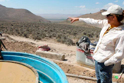 Melissa Boerst, a Lithium Nevada Corp. geologist, points to an area of future exploration from a drill site at the Thacker Pass Project, Humboldt County, Nev., Sept. 13, 2018.