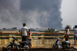 Smoke billows from the industrial zone of Hlaing Thar Yar township, Yangon, Myanmar, March 14, 2021.