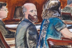 Courtroom sketch of Joshua Schulte, center, flanked by his attorneys during jury deliberations in New York, March 4, 2020.